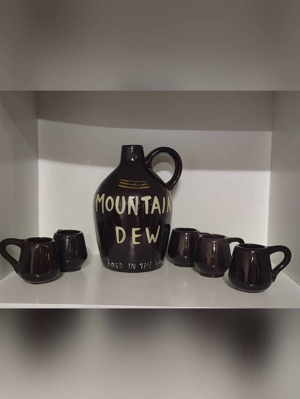 VTG Mountain Dew Made in the Woods Moonshine Jug with 5 Mini Mugs Set